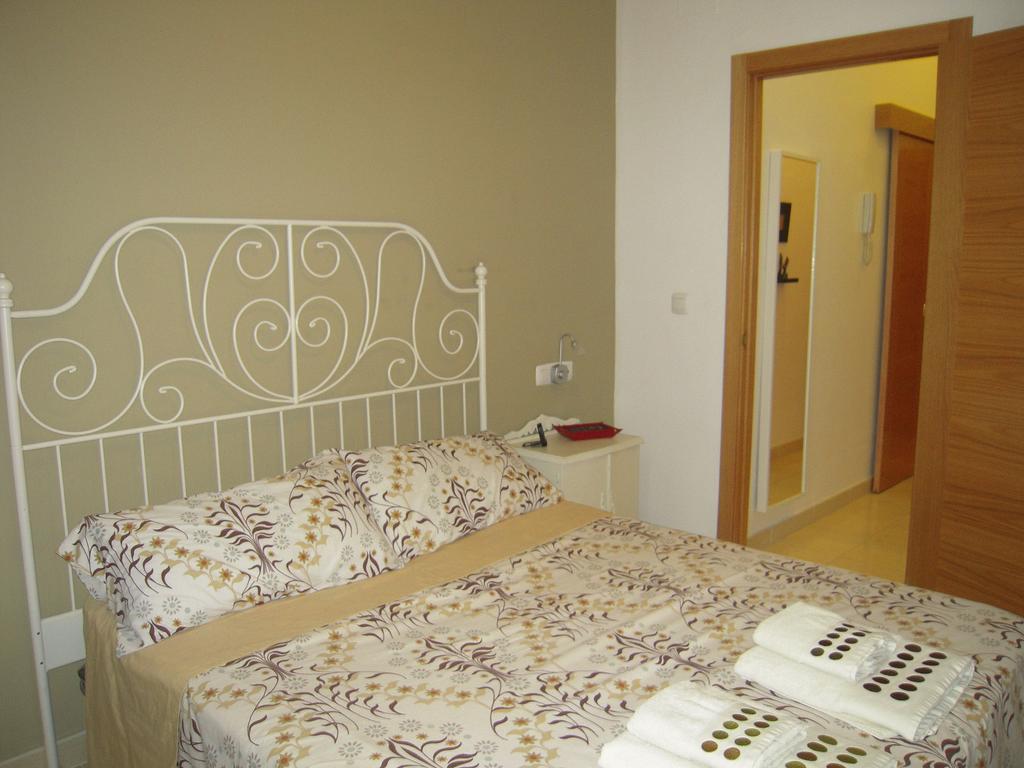 MALAMA Apartamentos Turísticos Málaga Quarto foto